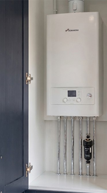 Combination boiler in kitchen