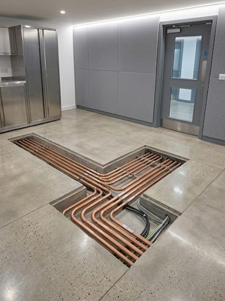 copper pipework in the floor